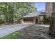 Large two-car garage with a door to enter the property at 4691 Mill Pond Rd., Murrells Inlet, SC 29576