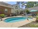 View of the in-ground pool from the backyard of the house at 4691 Mill Pond Rd., Murrells Inlet, SC 29576