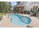 In-ground pool with ladder and waterfall at 4691 Mill Pond Rd., Murrells Inlet, SC 29576