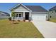 Charming single-Gathering home with a well-manicured lawn and inviting entrance at 481 Magnolia Terrace Dr, Myrtle Beach, SC 29579