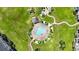 Aerial shot of the community pool with loungers, well maintained greenery, and easy access to residents at 4827 Orchid Way # 1-203, Myrtle Beach, SC 29577