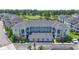 Three-story condo building boasts garages, balconies, and a picturesque golf course view at 4827 Orchid Way # 1-203, Myrtle Beach, SC 29577