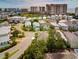 Aerial view of a coastal community featuring a variety of homes with beautiful landscaping and amenities at 4986 Salt Creek Ct., North Myrtle Beach, SC 29582