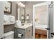 Charming bathroom with a single vanity, and a view into the bedroom at 4986 Salt Creek Ct., North Myrtle Beach, SC 29582