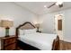 Cozy bedroom featuring a comfortable bed, wooden furniture, and ample natural light at 4986 Salt Creek Ct., North Myrtle Beach, SC 29582