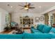 Bright living room featuring a large entertainment center and stylish furnishings at 4986 Salt Creek Ct., North Myrtle Beach, SC 29582