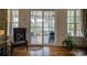 Living room featuring sliding doors leading to an outdoor area and hardwood floors at 4986 Salt Creek Ct., North Myrtle Beach, SC 29582
