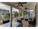Spacious covered porch with comfortable seating and beautiful neighborhood views at 4986 Salt Creek Ct., North Myrtle Beach, SC 29582