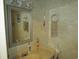 Well-maintained bathroom featuring a vanity, decorative wall hangings, and coastal-themed accessories at 500 Fairway Village Dr. # 4-F, Myrtle Beach, SC 29588