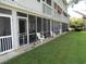 View of screened in porch and the outdoor space of this townhome residence at 500 Fairway Village Dr. # 4-F, Myrtle Beach, SC 29588