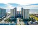 Stunning aerial view of resort with the ocean in the background on a sunny day at 5300 N Ocean Blvd. # 442, Myrtle Beach, SC 29577