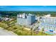 Wide aerial shot showcasing complex amenities, including a pool, playground, parking and beach access at 5300 N Ocean Blvd. # 442, Myrtle Beach, SC 29577
