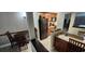 Well-equipped kitchen with stainless steel sink, dark appliances and wood cabinets at 5300 N Ocean Blvd. # 442, Myrtle Beach, SC 29577