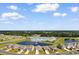 Aerial view showcases 534 Calhoun Falls Dr home and community pond at 534 Calhoun Falls Dr., Myrtle Beach, SC 29579
