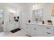 Elegant bathroom with double vanity, marble countertops, and modern fixtures and lighting at 534 Calhoun Falls Dr., Myrtle Beach, SC 29579