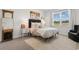 Comfortable bedroom with a plush bed, accent pillows, and a view of the outdoors from the window at 534 Calhoun Falls Dr., Myrtle Beach, SC 29579