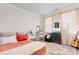 Bright, colorful bedroom featuring a cozy bed, vanity area, and ample natural light at 534 Calhoun Falls Dr., Myrtle Beach, SC 29579
