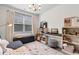 Bright bedroom features a window, hardwood floors, and a decorative rug at 534 Calhoun Falls Dr., Myrtle Beach, SC 29579