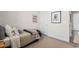 Bedroom with carpet and a comfortable bed with grey and patterned covers at 534 Calhoun Falls Dr., Myrtle Beach, SC 29579
