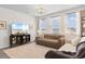 Cozy living room featuring ample natural light, comfortable seating, and stylish decor at 534 Calhoun Falls Dr., Myrtle Beach, SC 29579