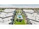Beautiful aerial view of the condo complex with a sparkling pool and manicured grounds at 5601 N Ocean Blvd. # B-314, Myrtle Beach, SC 29577