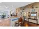 Open-concept kitchen featuring granite counters, stainless appliances, and seamless transition to living spaces at 5712 Whistling Duck Dr., North Myrtle Beach, SC 29582
