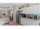 Well-appointed kitchen with stainless steel appliances, granite countertops and a pantry at 5712 Whistling Duck Dr., North Myrtle Beach, SC 29582
