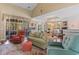 Spacious living room with high ceilings, comfortable seating, and abundant natural light, perfect for relaxation and entertainment at 5712 Whistling Duck Dr., North Myrtle Beach, SC 29582