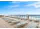 A patio with many lounge chairs and ocean views at 5712 Whistling Duck Dr., North Myrtle Beach, SC 29582