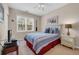 Bedroom featuring a bed, neutral walls, and a natural light window, complemented by a ceiling fan at 601 Hillside Dr. N # 3926, North Myrtle Beach, SC 29582