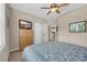A bedroom with a ceiling fan, a double bed, natural light window, and built in closet at 601 Hillside Dr. N # 3926, North Myrtle Beach, SC 29582