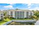 Beautiful waterfront condo building with multiple screened-in patios and well-maintained landscaping at 601 Hillside Dr. N # 3926, North Myrtle Beach, SC 29582