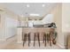Efficient kitchen with bar stool seating, white cabinets, and plenty of storage space at 601 Hillside Dr. N # 3926, North Myrtle Beach, SC 29582
