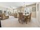 Combined living and dining area with natural light, comfortable seating, and modern furnishings at 601 Hillside Dr. N # 3926, North Myrtle Beach, SC 29582