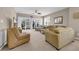 Relaxing living room featuring neutral tones, large windows, and comfortable seating area with balcony at 601 Hillside Dr. N # 3926, North Myrtle Beach, SC 29582