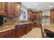 A gourmet kitchen is designed with granite countertops, stainless appliances, and custom cabinets at 664 Oxbow Dr., Myrtle Beach, SC 29579