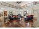 Elegant living room with high ceilings, hardwood floors, and stylish decor throughout the space at 664 Oxbow Dr., Myrtle Beach, SC 29579