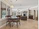 An open living space featuring tile floors, large windows, and a view to the outside at 664 Oxbow Dr., Myrtle Beach, SC 29579
