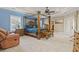 The primary bedroom offers a tray ceiling, a sitting area, and a large ensuite bathroom at 664 Oxbow Dr., Myrtle Beach, SC 29579