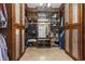A custom walk-in closet provides ample storage, closet organizers, and great lighting at 664 Oxbow Dr., Myrtle Beach, SC 29579