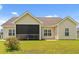 Beautiful backyard with a screened porch and well-maintained lawn at 716 Weston Dr., Conway, SC 29526