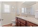 Bright bathroom features a granite countertop, wood cabinet, and tub and shower combo at 716 Weston Dr., Conway, SC 29526
