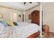 Elegant bedroom featuring a canopy bed, decorative molding, and a spacious armoire at 716 Weston Dr., Conway, SC 29526