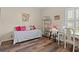 Cozy bedroom with wood flooring, a daybed, and decorative furnishings at 716 Weston Dr., Conway, SC 29526