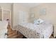 Comfortable bedroom featuring wood floors and a floral bedspread at 716 Weston Dr., Conway, SC 29526