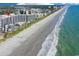 Oceanfront resort with pristine sandy beach, clear blue water, and city views at 7200 N Ocean Blvd. # 459, Myrtle Beach, SC 29572