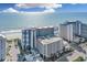 Breathtaking aerial view of the high-rise resort with beach access, pool, and parking at 7200 N Ocean Blvd. # 459, Myrtle Beach, SC 29572