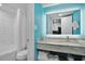 Modern bathroom with a granite vanity, a brightly lit mirror, and a shower-tub combination at 7200 N Ocean Blvd. # 459, Myrtle Beach, SC 29572