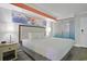 Bright bedroom featuring a plush bed, colorful artwork, and modern bedside tables with lamps at 7200 N Ocean Blvd. # 459, Myrtle Beach, SC 29572