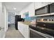 Modern kitchen featuring white cabinets, stainless steel appliances, and a breakfast bar at 7200 N Ocean Blvd. # 459, Myrtle Beach, SC 29572